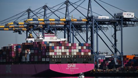 Cranes unload cargo shipping containers from the ONE Hannover container ship at the Port of Los Angeles in San Pedro, California, on April 10, 2025. (Patrick T. Fallon/AFP via Getty Images)