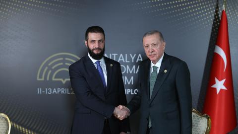 Turkish President Recep Tayyip Erdogan and Syrian President Ahmed al-Shara meet during the fourth edition of the Antalya Diplomacy Forum in Antalya, Türkiye, on April 11, 2025. (Turkish Presidency via Getty Images)
