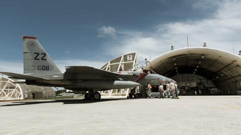 Airmen store an F-15C Eagle in a hardened aircraft shelter in preparation for Typhoon Maria on July 9, 2018, at Kadena Air Base, Japan. (DVIDS)