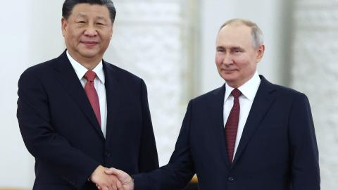 Russian President Vladimir Putin meets with China's President Xi Jinping at the Kremlin in Moscow on March 21, 2023. (Sergei Karpukhin via Getty Images)