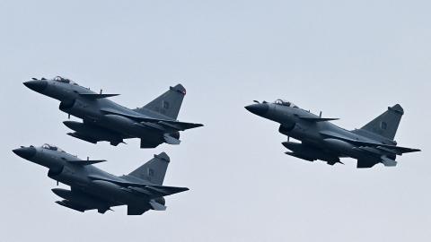 Chinese-made Pakistan Air Force J-10C fighter jets perform at a rehearsal ahead of Pakistan’s national day parade in Islamabad on March 21, 2024. (Getty Images)
