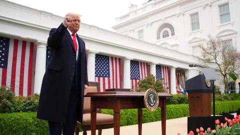 US President Donald Trump reacts after signing executive orders imposing tariffs on imported goods in the Rose Garden at the White House on April 2, 2025, in Washington, DC. (Andrew Harnik via Getty Images)