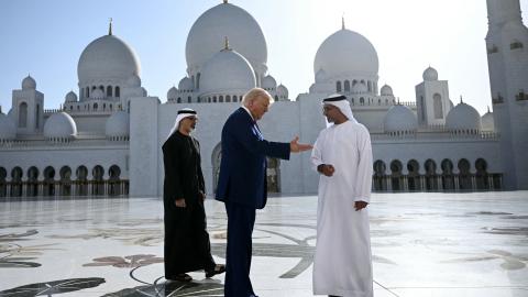 Yousif al-Obaidli, the director-general of the Sheikh Zayed Grand Mosque, accompanies US President Donald Trump on a mosque tour in Abu Dhabi on May 15, 2025.  (Brendan Smialowski via Getty Images)