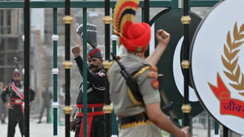 Pakistani ranger and Indian Border Security Force member on the outskirts of Amritsar, India, on May 20, 2025. (Narinder Nanu via Getty Images)