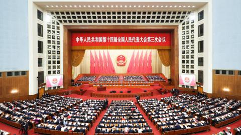 The opening meeting of the third session of the Fourteenth National People’s Congress is held at the Great Hall of the People in Beijing on March 5, 2025. (Ding Haitao via Getty Images)