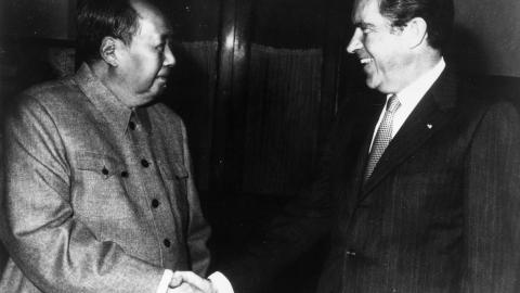 Chinese Chairman Mao Zedong shakes hands with US President Richard Nixon in Beijing during his visit to China. (Getty Images)
