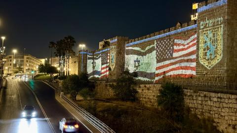 US and Israeli flags are projected on the historic walls of the Old City near Hebron Gate in Jerusalem after the United States carried out airstrikes on Iran’s nuclear sites on June 22, 2025. (Gazi Samad via Getty Images)