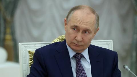 Russian President Vladimir Putin listens during a meeting on the development of occupied regions of Ukraine at the Kremlin on June 30, 2025. (Getty Images)