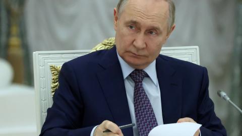 Russian President Vladimir Putin listens during a meeting on the development of occupied regions of Ukraine at the Kremlin on June 30, 2025. (Getty Images)