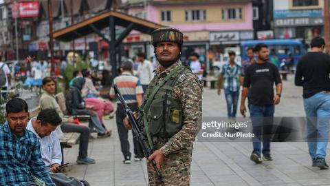 An Indian security personnel stands guard along a street in Srinagar, Jammu and Kashmir, on July 15, 2025. (Firdous Nazir via Getty Images)