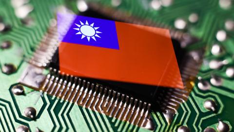 A microchip and Taiwanese flag displayed on a phone screen are seen in this multiple exposure illustration photo on April 10, 2023. (Jakub Porzycki via Getty Images)