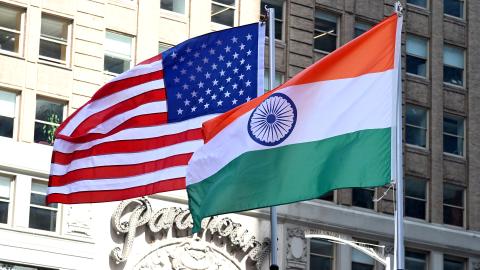 The national flag of India is hoisted next to the US national flag at Times Square to mark Indian Independence Day in New York City.  (Jamie McCarthy via Getty Images)