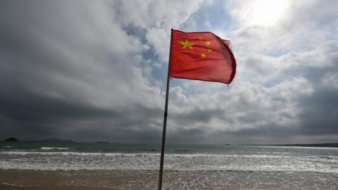 A Chinese flag flutters in the wind at a beach on Pingtan Island, the closest point in China to Taiwan’s main island, in Fujian Province, China, on October 15, 2024. (Adek Berry via Getty Images)