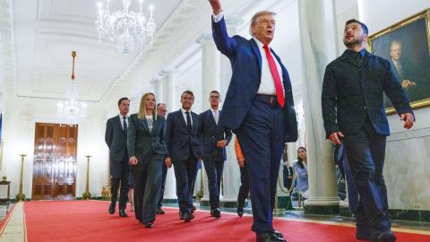 President Donald Trump leads President Volodymyr Zelenskyy and other European leaders in the Cross Hall of the White House on August 18, 2025. (Aaron Schwartz via Getty Images)