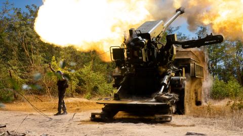 A soldier of an artillery crew from Ukraine's 44th Hetman Danylo Apostol Separate Artillery Brigade stands by a 2S22 Bohdana self-propelled howitzer that is fired during a combat mission in the Zaporizhzhia sector, Ukraine, on August 20, 2025. (Photo by Danylo Antoniuk/Ukrinform/NurPhoto via Getty Images) NO USE RUSSIA. NO USE BELARUS. (Photo by Ukrinform/NurPhoto via Getty Images)