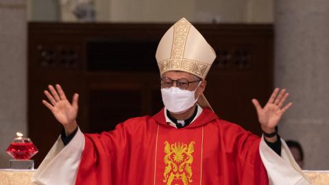 Bishop Stephen Chow waves to church members at the Episcopal Ordination of the Most Reverend Stephen Chow in Hong Kongs Cathedral of the Immaculate Conception on December 4, 2021. (Photo by Bertha Wang/AFP via Getty Images)