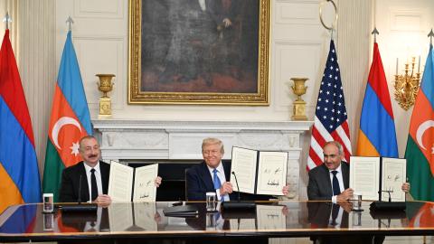 : President Donald Trump, Azerbaijani President Ilham Aliyev, and Armenian Prime Minister Nikol Pashinyan sign a joint declaration at the White House in Washington DC, on August 8, 2025. (Getty Images)