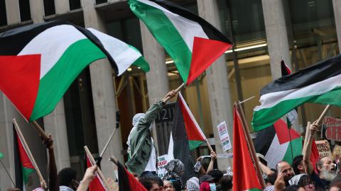 NEW YORK, NEW YORK - OCTOBER 07: Pro-Palestinian activists protest the war in Gaza on the October 7th Anniversary at the Newscorp headquarters on October 07, 2025 in New York City. The protest was held on the second anniversary of Hamas’s Oct. 7, 2023 attack on Israel that killed about 1,200 people and saw 251 hostages taken. Forty-eight hostages remain in Gaza. Gaza’s health authorities say more than 67,000 Palestinians have been killed in a war that has also displaced roughly 2 million people. Talks are u