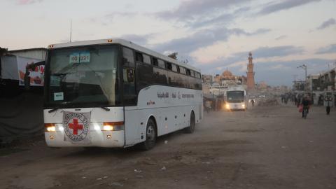 Buses with the International Red Cross emblem move toward the eastern Gaza Strip on October 13, 2025, ahead of the release of Israeli hostages held by Hamas since the October 7 attacks. (Getty Images)