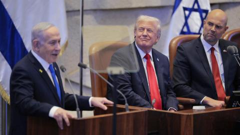 Israeli Prime Minister Benjamin Netanyahu addresses the Knesset as President Donald Trump and Amir Ohana, speaker of the Israeli Knesset, look on October 13, 2025, in Jerusalem. (Getty Images)