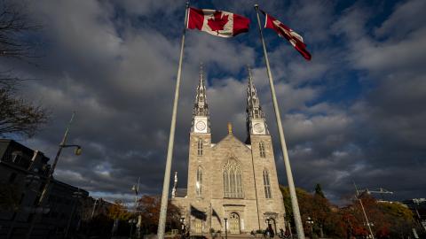The Canadian flag flies in front of the Notre Dame Cathedral Basilica near Parliament Hill on October 26, 2025, in Ottawa, Ontario, Canada. (Getty Images)