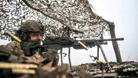 A Ukrainian soldier practices using a machine gun during shooting and tactical drills in Ukraine on November 10, 2025. (Getty Images)