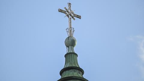 A cross is on the steeple of a church in Montreal, Quebec, Canada, on December 1, 2025. (Photo by Graham Hughes/NurPhoto via Getty Images)