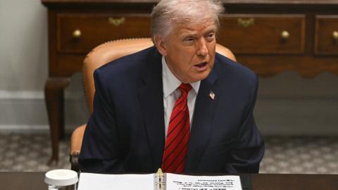 US President Donald Trump speaks during a roundtable discussion in the Roosevelt Room of the White House in Washington, DC, on December 10, 2025. (Getty Images) Share to Twitter