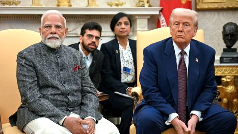 US President Donald Trump speaks with the press as he meets with Indian Prime Minister Narendra Modi in the Oval Office of the White House in Washington, DC, on February 13, 2025. (Photo by Jim WATSON / AFP) (Photo by JIM