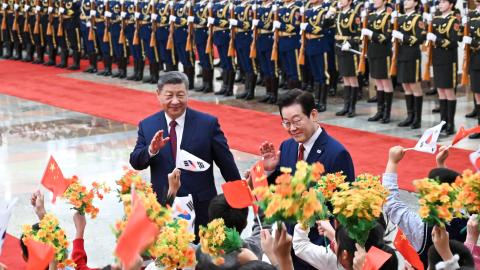 Chinese President Xi Jinping holds a welcome ceremony for President of the Republic of Korea Lee Jae Myung, in the Great Hall of the People in Beijing, January 5, 2026. (Getty Images) Share to Twitter