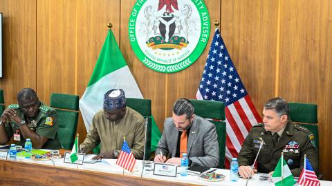 Retired Gen. Christopher Gwabin Musa, Nigeria’s minister of defense, and Mr. Brian J. Ellis, U.S. deputy assistant secretary of war for African affairs, sign a defense cooperation roadmap in Abuja, Nigeria, on January 23, 2026. (US Army)