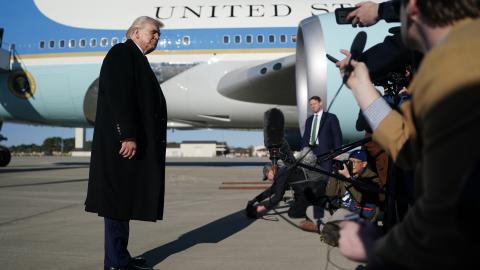 President Donald Trump speaks with the media before boarding Air Force One at Pope Army Airfield on February 13, 2026, in North Carolina. (Getty Images)