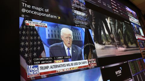 A press conference by President Donald Trump on tariffs is displayed on a television at the New York Stock Exchange on February 20, 2026. (Getty Images)