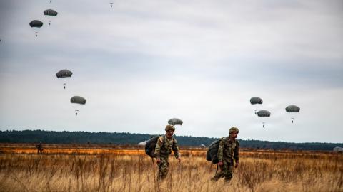 U.S. Army paratroopers assigned to 1st Brigade Combat Team, 82nd Airborne Division conduct an airborne operation onto Sicily Drop Zone at Fort Bragg, North Carolina, 08 December 2022. Airborne operations showcase rapid deployment capabilities and joint readiness within the force.(U.S. Army photo by Sgt. Jillian Hix)