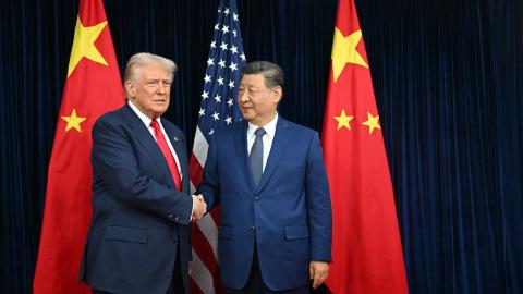 US President Donald Trump and China’s President Xi Jinping shake hands as they arrive for talks at the Gimhae Air Base in Busan, Korea, on October 30, 2025. (Getty Images)