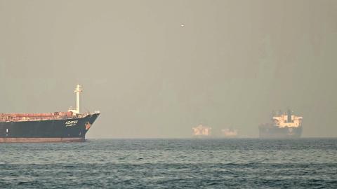 Cargo ships and tankers are seen in the Strait of Hormuz on February 25, 2026. (Getty Images)