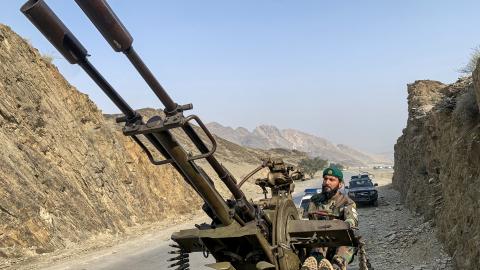 A Taliban security personnel operates an anti-aircraft gun near the Torkham border crossing between Afghanistan and Pakistan on February 27, 2026. (Getty Images)
