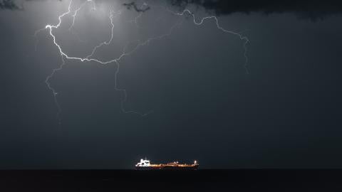 Lightning occurs when META 4, an Oil Products Tanker, sails into Muscat Anchorage on March 21, 2026, at Sultan Qaboos Port in Muscat, Oman. (Getty Images)