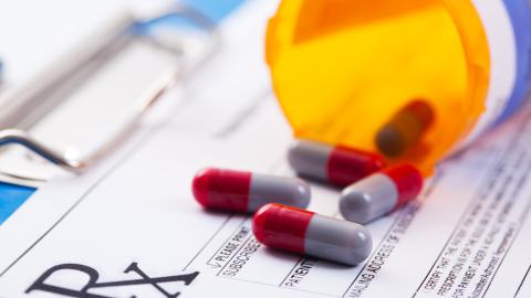 Bottle of prescription drugs laying on RX prescription (Getty Stock Photo) Share to Twitter