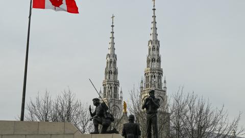 A partial view of the Reconciliation: The Peacekeeping Monument, honoring Canada's peacekeeping efforts, and the Notre-Dame Cathedral Basilica in the background, in Ottawa, Ontario, Canada, on April 30, 2025. (Photo by Artur Widak/NurPhoto via Getty Images)