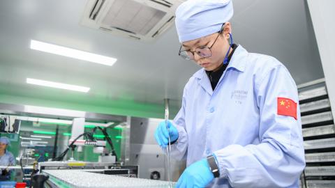 An employee works at the workshop of Hainan Brilliant Pharmaceutical Co., Ltd. on January 7, 2026 in Haikou, Hainan Province of China. (Photo by Su Bikun/VCG via Getty Images)