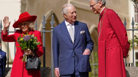 King Charles III and Queen Camilla talk to Reverend Christopher Cocksworth as they leave after attending the 2026 Easter Matins Service at St George's Chapel on April 5, 2026 in Windsor, England. (Photo by Alberto Pezzali - WPA Pool/Getty Images)