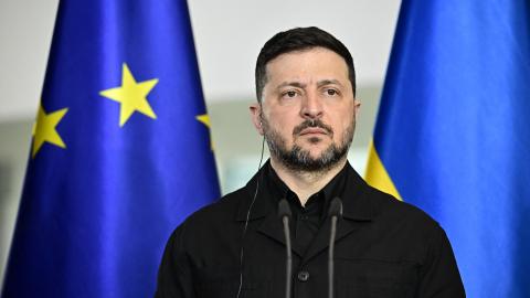 Ukrainian President Volodymyr Zelensky attends a joint press conference with the German Chancellor at the Chancellery in Berlin on April 14, 2026 during German-Ukrainian government consultations. The meeting comes as US-initiated peace talks between Russia and Ukraine have stalled, with Kyiv baulking at the idea it could cede territory to Russia. (Photo by Tobias SCHWARZ / AFP via Getty Images)