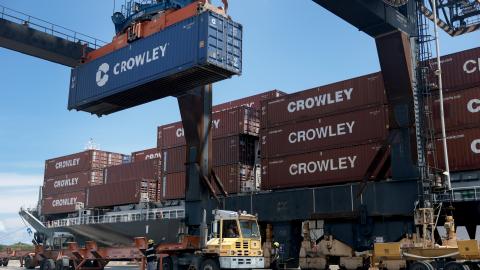  Dock workers offload shipping containers from a ship at Port Everglades on April 20, 2026 in Fort Lauderdale, Florida. The U.S. government has launched an online portal for companies to claim refunds for tariffs invalidated by the Supreme Court earlier this year. In a 6-3 decision, the Court ruled that President Donald Trump overstepped Congress’s tax-setting authority by imposing new import tax rates on products from nearly every country, citing the U.S. trade deficit as a national emergency. More than 30