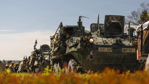 US soldiers stage Stryker vehicles and perform maintenance checks before convoy operations across Germany in support of Sword 26 at Vilseck, Germany, on April 27, 2026. (US Army Reserve)