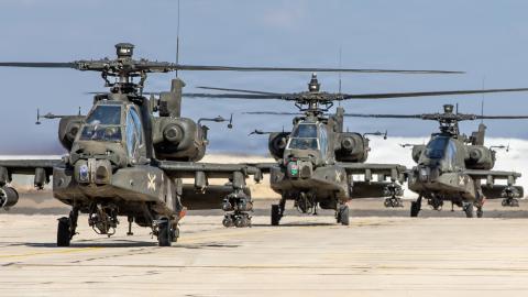 A flight of U.S. Army AH-64 Apache attack helicopters, armed with rockets and Hellfire missiles, taxi out to conduct a scheduled flight in the U.S. Central Command area of responsibility. In addition to rockets and missiles, the Apache is additionally armed with a 30mm chain gun. (U.S. Army photo)