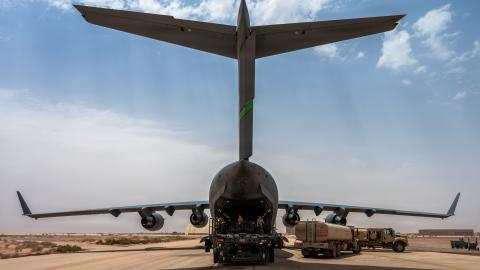 U.S. Air Force Airmen load cargo onto a C-17 Globemaster III aircraft at a base in the Middle East during Operation Epic Fury, April 18, 2026. (U.S. Air Force photo by Senior Airman Travis Knauss)