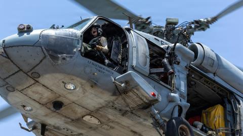 U.S. Navy MH-60 Sea Hawk helicopters are supporting Project Freedom in and near the Strait of Hormuz. Earlier today, Sea Hawk and U.S. Army AH-64 Apache helicopters were used to eliminate Iranian small boats threatening commercial shipping. (U.S. Navy Photo)