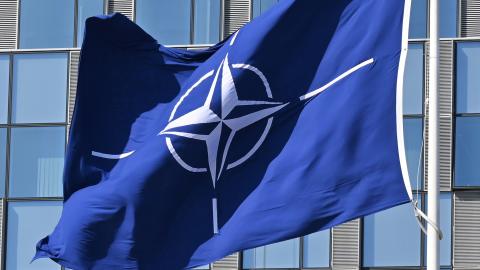 A NATO flag flies in the wind in front of the NATO headquarters in Brussels on April 3, 2025. (Getty Images)