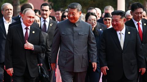 Russia's President Vladimir Putin walks with China's President Xi Jinping and North Korea's leader Kim Jong Un in Beijing's Tiananmen Square on September 3, 2025. (Getty Images)